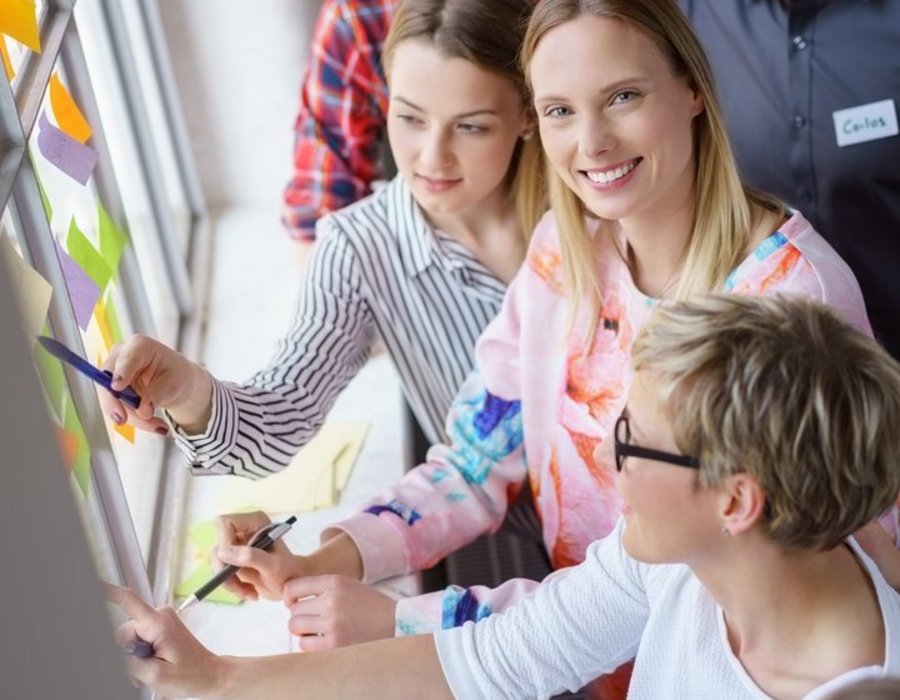teilnehmer in einem workshop Unser Service für Sie